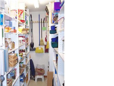 Large walk-in pantry just off the kitchen.