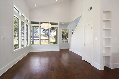 Gorgeous Dining Room with Vaulted Ceiling and Tran