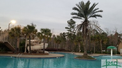 Resort Style Swimming Pool with Slide at Highlands