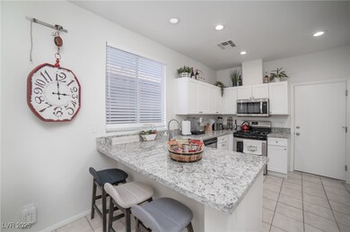 Kitchen featuring appliances with stainless steel