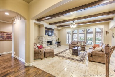 So much detail! Handcrafted distressed beams, trav