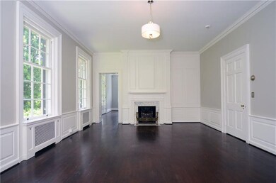 Elegant dining room with high ceilings and abundan