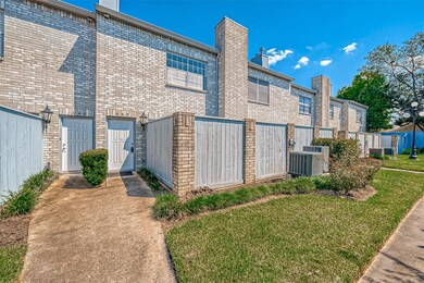 All brick facade with soft grey pallete.