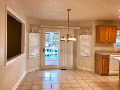 Large eat in kitchen with access to the 23x12 cove