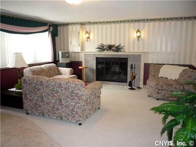 Family Room. Finished family rm w/ firpelace. That