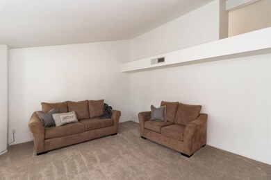 Large front living room with high ceiling