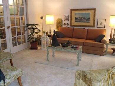 The Living Room has pocket doors to the Family Roo