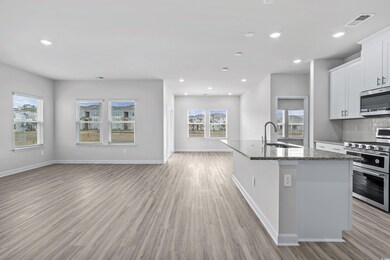 Kitchen featuring sink, stainless steel appliances
