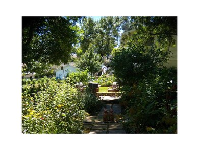 Yard/Garden. walkway to Rear of House