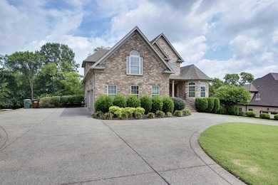 Circular drive with lots of extra parking space