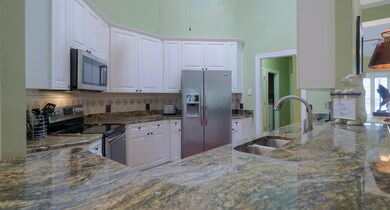 Kitchens w granite and stainless App