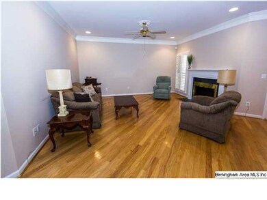Huge Great Room featuring Plantation Shutters & Ti