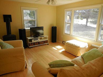 Living Room. This 16 x 12 living room is sunny and