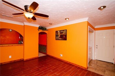 Living Room and View of Pass-Thru to Kitchen, and 