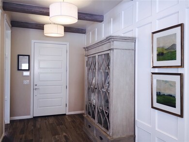 Photo is of the Delamar Model foyer and is for dem