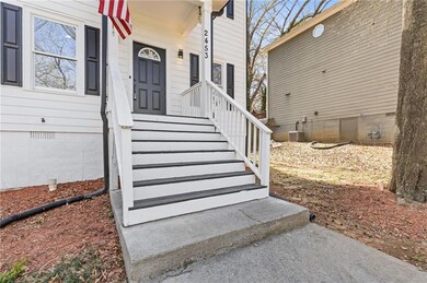 Doorway to property featuring crawl space and central air condition unit