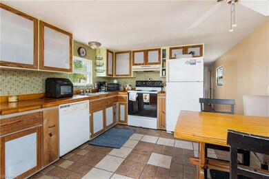 5659 Rainbow Dr, Bokeelia, FL 33922 - photo 5