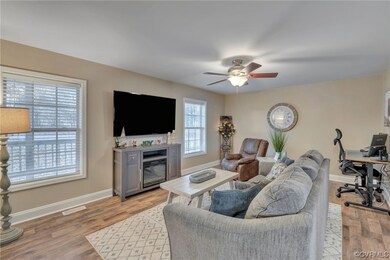 Living room with a healthy amount of sunlight, lig