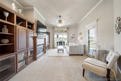 Large Living Room offers fireplace flanked by buil