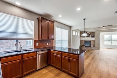 Kitchen featuring light hardwood / wood-style floo