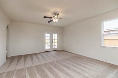 Natural light flows into the open and spacious ent