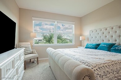 view of water & golf course