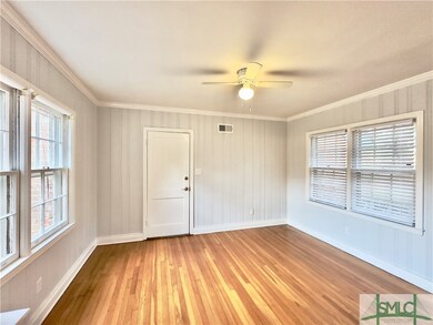 Office with entry to garage