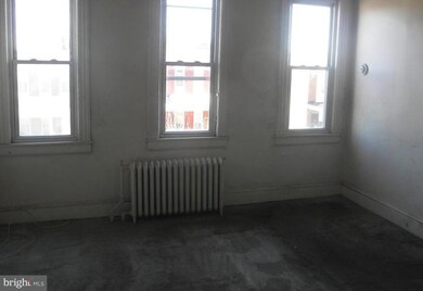 2108 N Longwood St, Baltimore, MD 21216 - photo 6