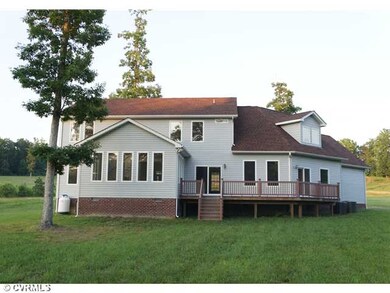 Exterior Back - Composition deck off the kitchen a