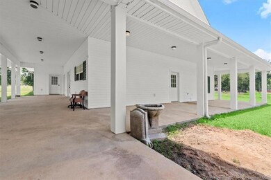 sprawling backyard and wrap-around porch.