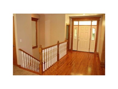 Foyer. Open Staircase, Wide baseboards, Custom Bui