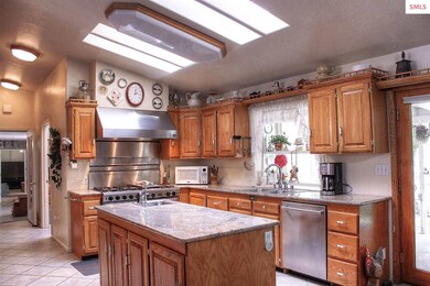 Granite counters, commercial range.