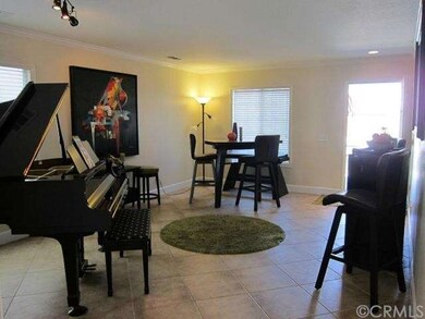 Another look at the Living room with front door to