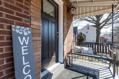 Relax on the front porch, notice the updated entry