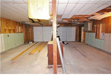 Over Sized Garage Large Enough For Four Cars.
