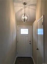Entryway - fresh paint, new door, new light, vault