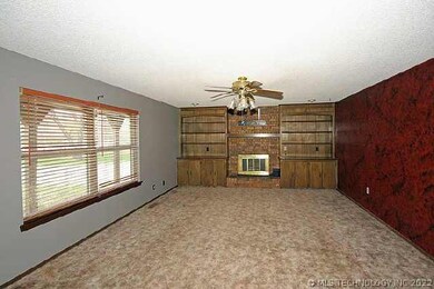 Looking into living room with fireplace