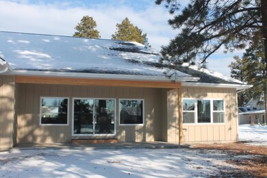Covered patio in rear of home