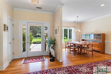 Light and bright Foyer with gorgeous wood floors