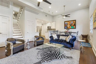 Open floor plan of living/dining areas and kitchen