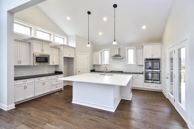 Hargrove- Luxury Kitchen with large island. Photo for representation purposes only. 