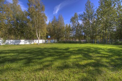 Back yard, fenced and landscaped