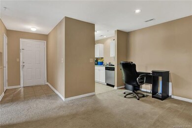 Foyer, dining room and kitchen