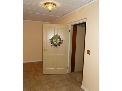 Entry/Foyer. Unit #32 is at the end of the hallway