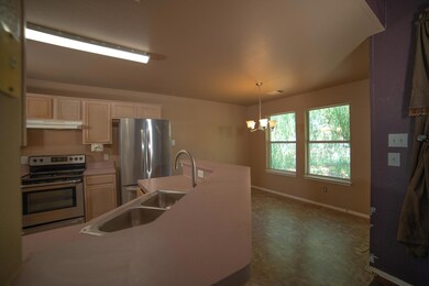 Kitchen with appliances with stainless steel finis