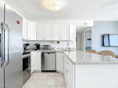 Kitchen featuring appliances with stainless steel
