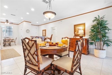 Dining room with light tile patterned flooring, ce
