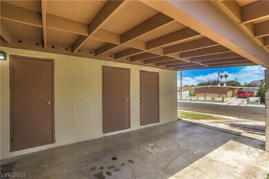 ATTACHED CARPORT WITH PLENY OF STORAGE
