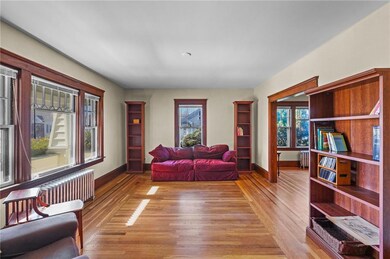 Living room with gorgeous in-laid hardwood floors,
