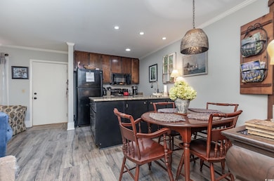 Dining space featuring light hardwood / wood-style